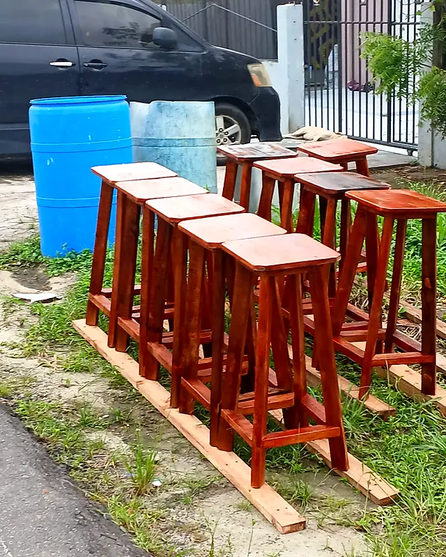 Row of tall backless mahogany bar stools – Lynn's Furniture