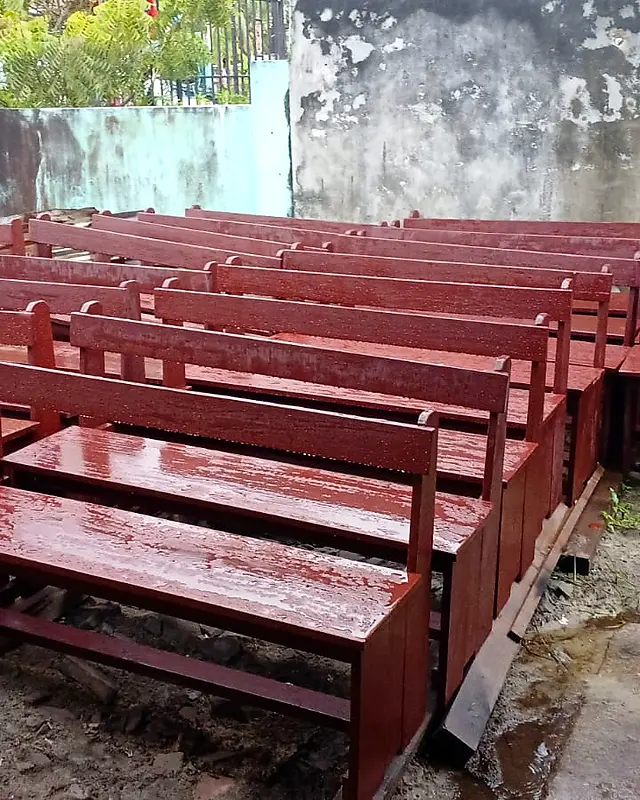 Rows of new mahogany benches with backrests – Lynn's Furniture