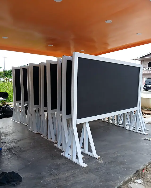 Row of wide chalkboards on white wooden stands – Lynn's Furniture