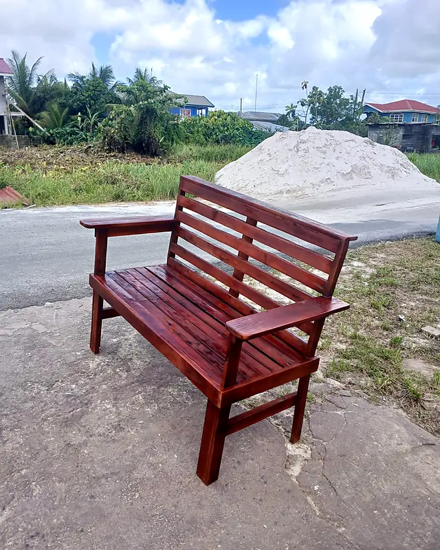 Mahogany wooden garden bench with wide armrests and a slatted back – Lynn's Furniture