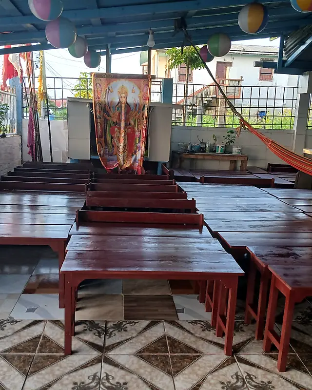 Mahogany tables and benches set up in a temple hall – Lynn's Furniture