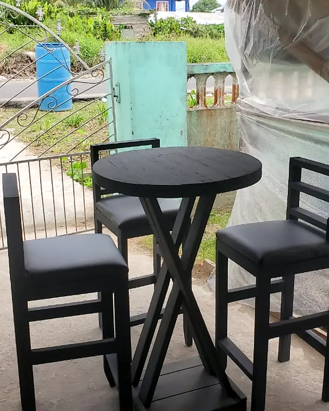 Black round bar table with three bar stools with grey padded seats – Lynn's Furniture