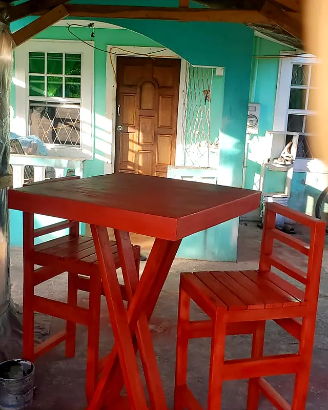 Square orange bar table with a crossed-leg base and two high bar chairs – Lynn's Furniture