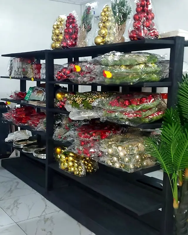 Black store shelving full of Christmas decorations in a shop – Lynn's Furniture