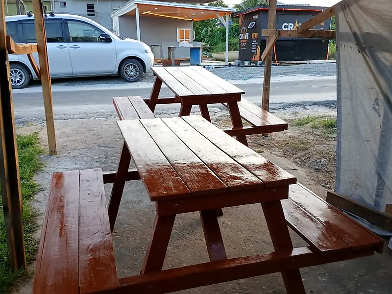 Two wooden picnic tables with benches in a mahogany gloss stain – Lynn's Furniture