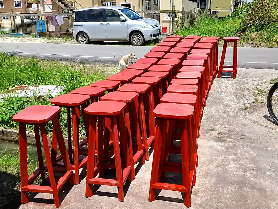 Rows of new mahogany-stained bar stools